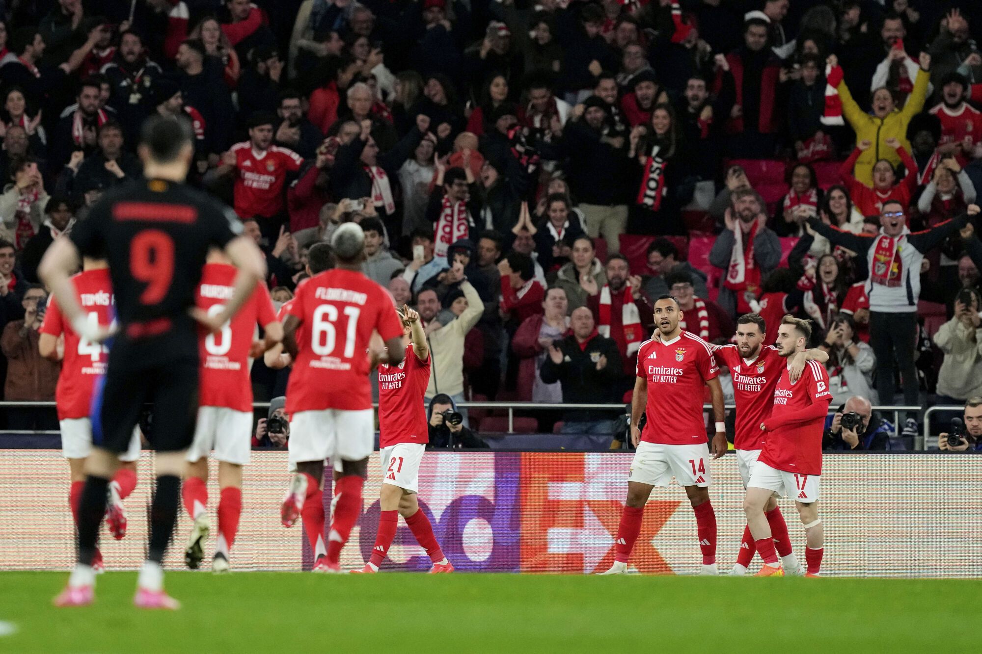 Benfica's Vangelis Pavlidis celebrates the opening goal during a Champions League opening phase soccer match between SL Benfica and FC Barcelona at the Luz stadium in Lisbon, Tuesday, Jan. 21, 2025. (AP Photo/Armando Franca)