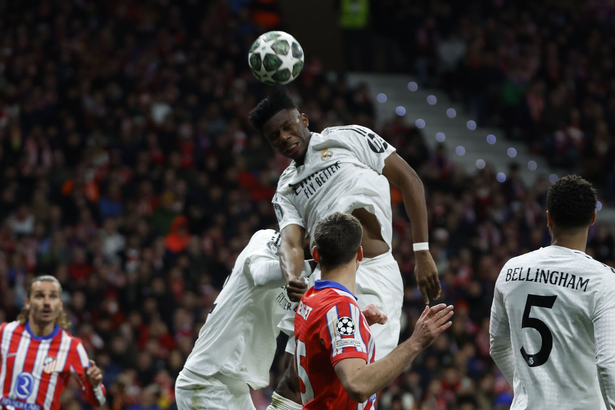 Madrid, 12703/2025.- The French midfielder of Real Madrid, Aurelien Tchouameni, heads the ball during the second round of the round of 16 of the Champions League that Atlético de Madrid and Real Madrid play this Wednesday at the Metropolitan Stadium. EFE/Juanjo Martín