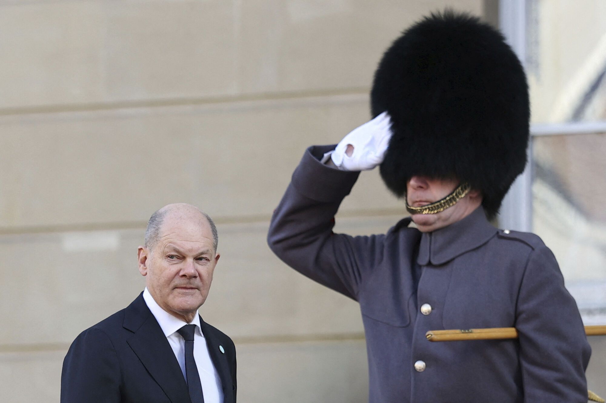 German Chancellor Olaf Scholz arrives for the European leaders' summit to discuss Ukraine, hosted by Britain's Prime Minister Keir Starmer, at Lancaster House, London, Sunday March 2, 2025. (Toby Melville/Pool via AP). EDITORIAL USE ONLY / ONLY ITALY AND SPAIN