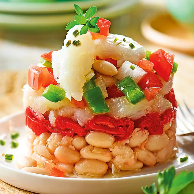 Timbal con judías, bacalao y pimientos