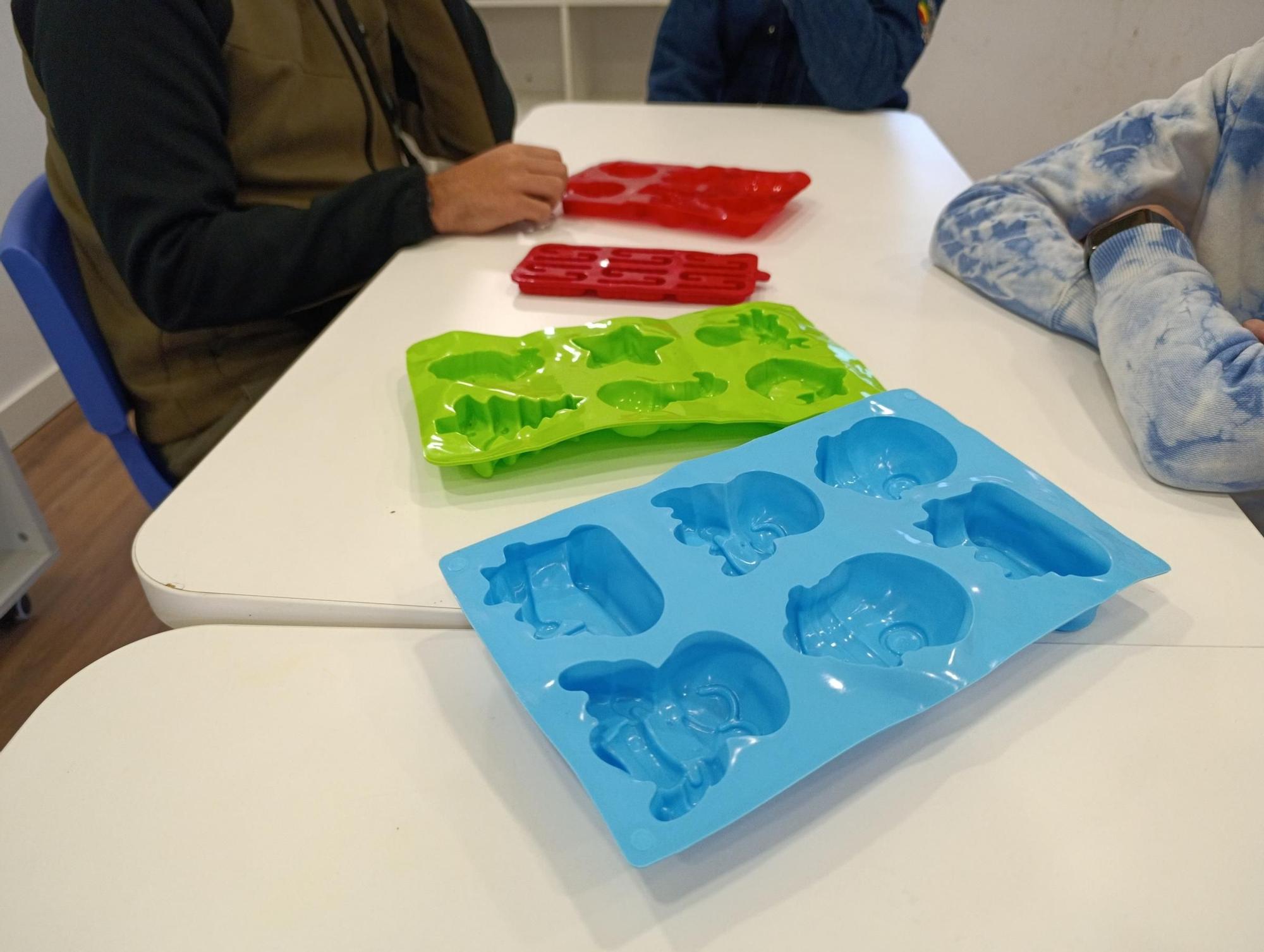 Velas aromáticas y adornos de resina en Soto de Llanera para Navidad