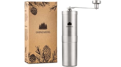 Molinillo manual con discos abrasivos de acero inoxidable.